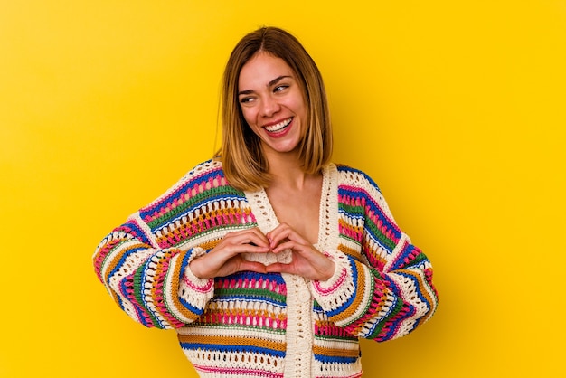 Smiling woman holding embroidered cloth